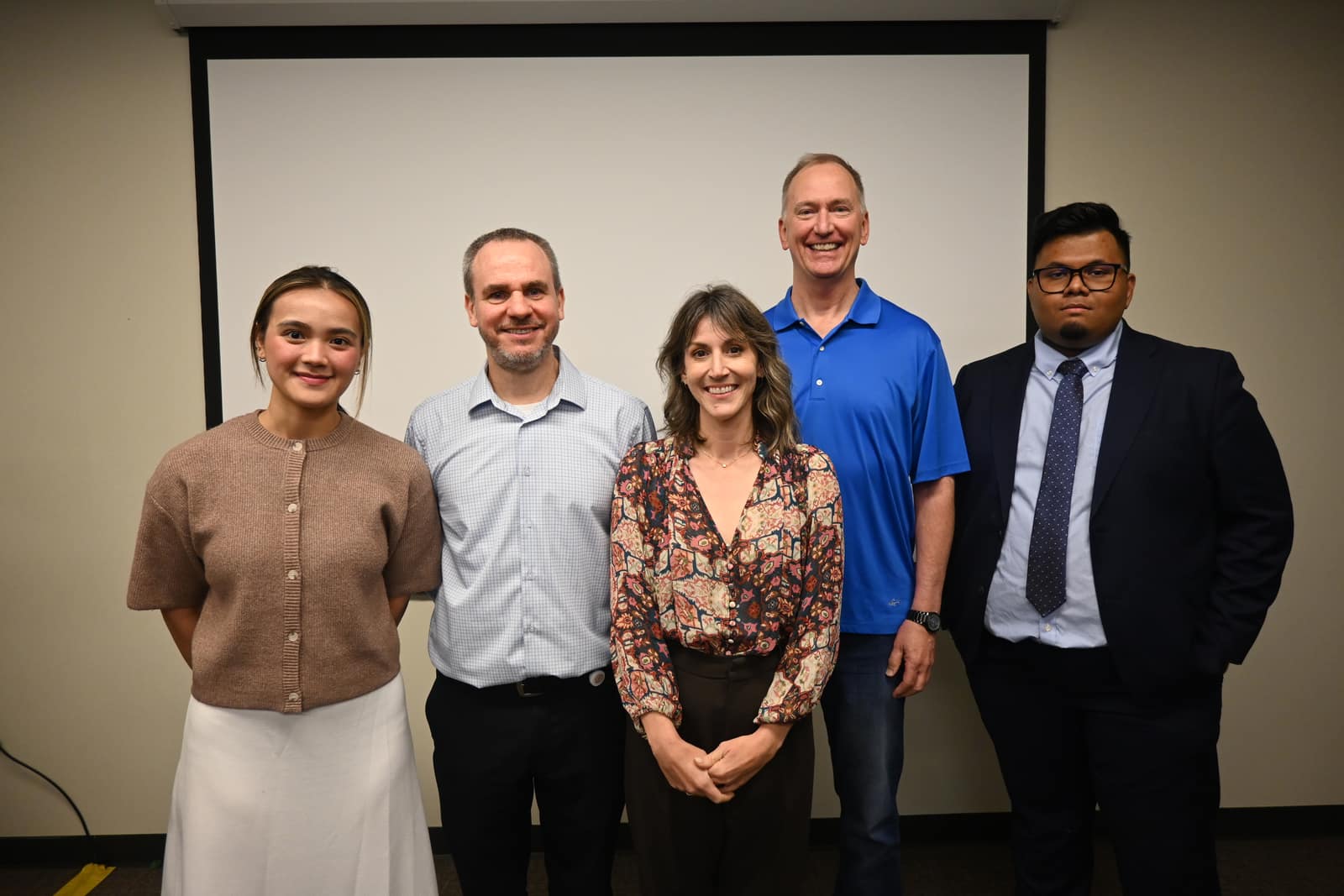 Officers with visiting decision professionals after the session